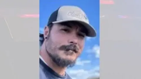 Authorities discover body they think US man wanted for murdering his daughters
